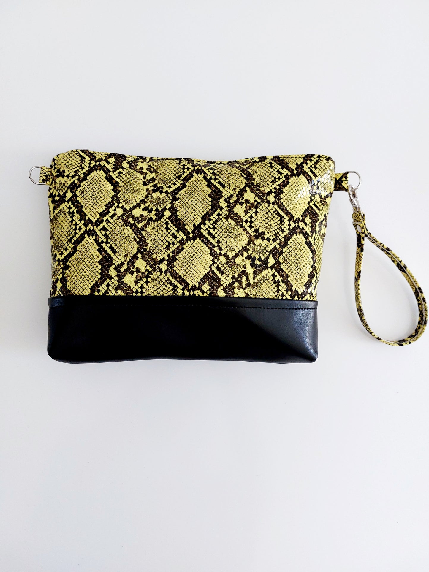 "POSCÈ" pochette in similpelle nero/pitone giallo